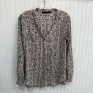 Black, white, tan spotted blouse